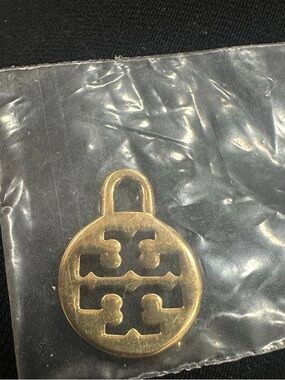 Tory Burch gold pendant